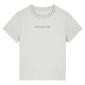 White organic cotton women's t-shirt featuring the motivational quote 'Becoming Her Daily' by Rivaex Clothing