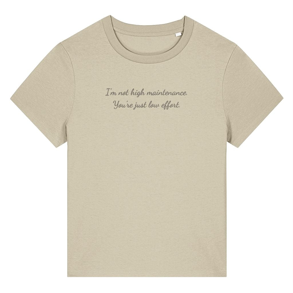 Beige organic cotton women's t-shirt featuring the funny quote ‘I'm Not High Maintenance. You're Just Low Effort.’ by Rivaex Clothing