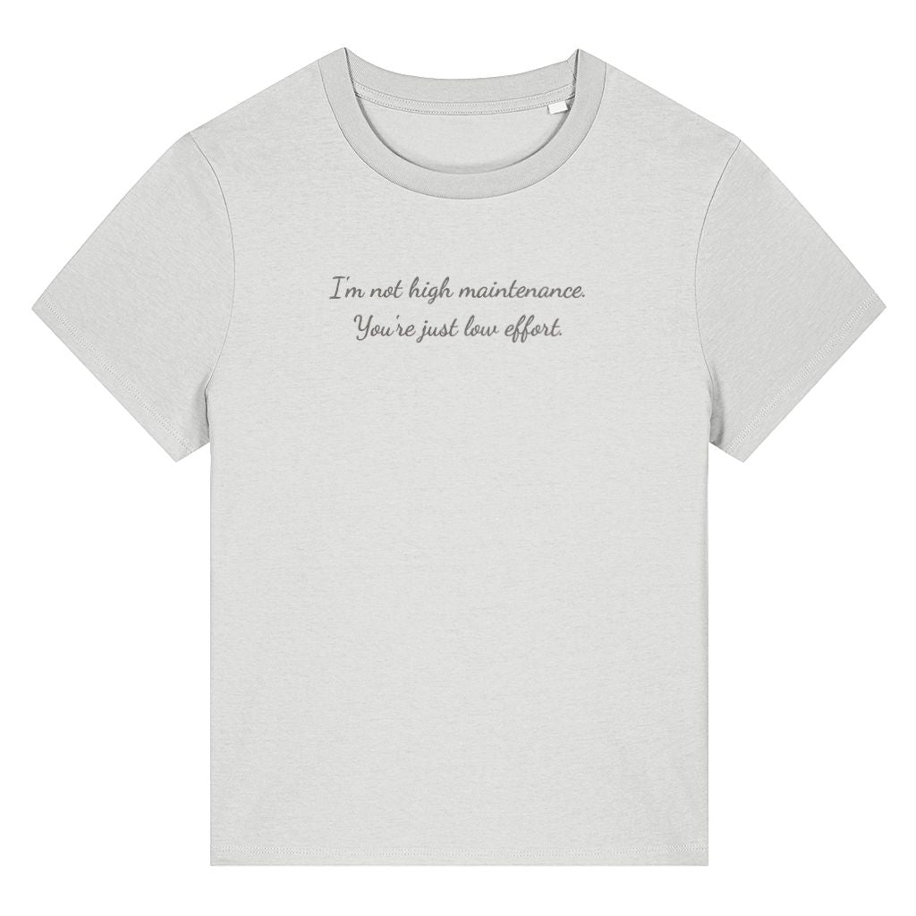 White organic cotton women's t-shirt featuring the funny quote ‘I'm Not High Maintenance. You're Just Low Effort.’ by Rivaex Clothing