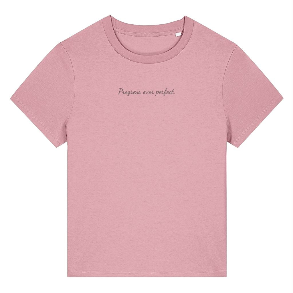 Pink organic cotton women's t-shirt featuring the motivational quote ‘Progress Over Perfect.’ by Rivaex Clothing